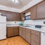 Refrigerator and appliance in a model apartment