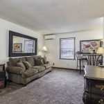 View of the living room in a two bedroom apartment